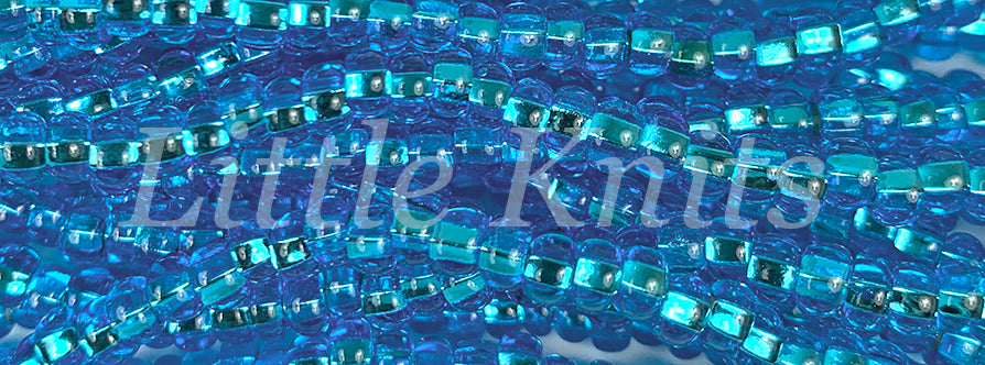 6/0 Preciosa Czech Seed Beads - Silver Lined Dark Aqua (Color #67150) - In 70 gram hanks with approx 900 beads in each hank
