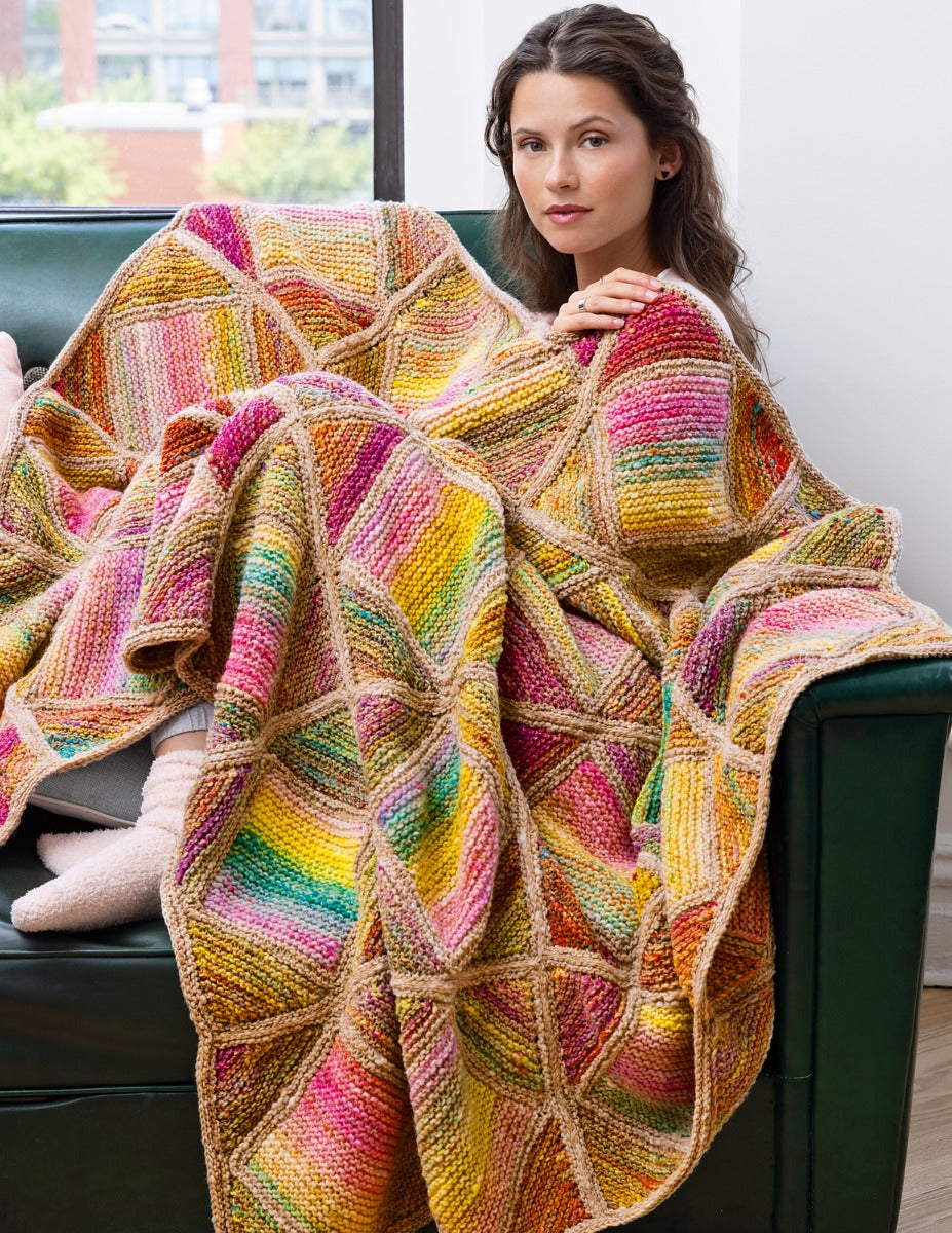 A Noro Malvinas & Viola Pattern - Pastel Tiles Blanket (PDF) on sale at Little Knits.